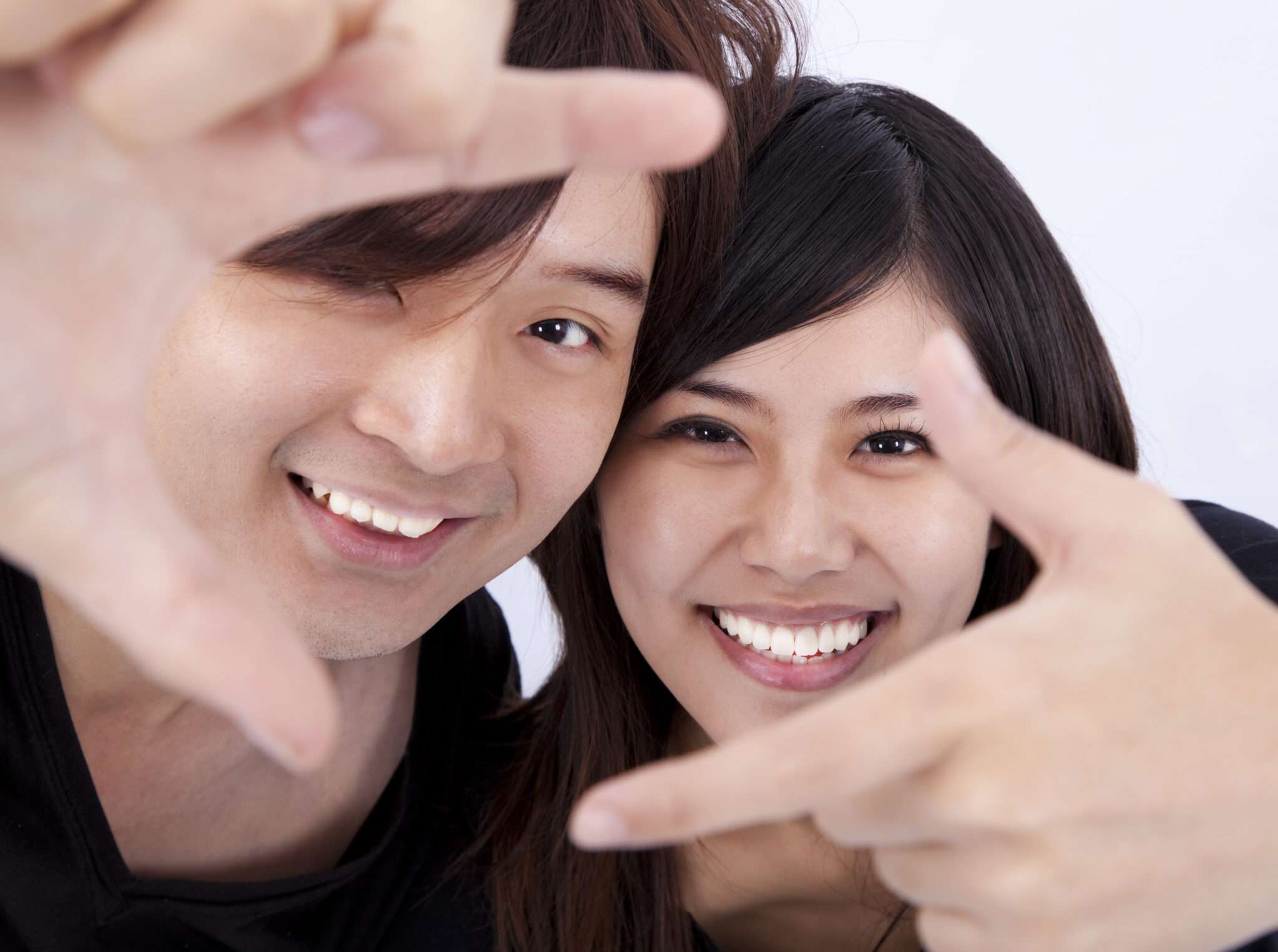 説明：中国にいる男性と女性の姿の写真。