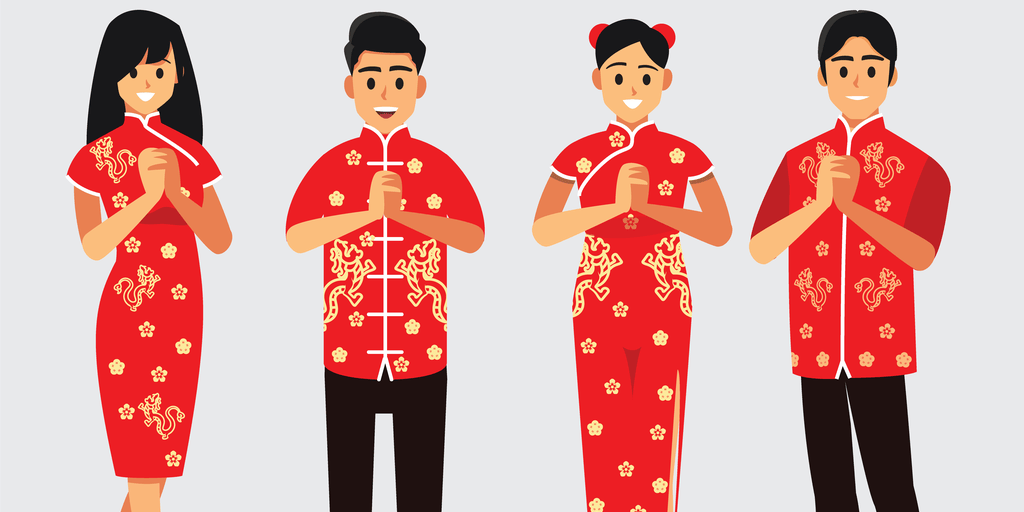 伝統的な衣装を着た中国の 4 人。