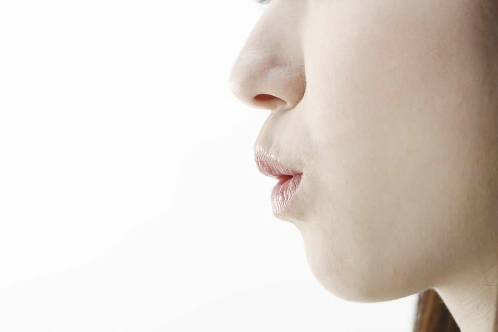 中国の女性の顔のクローズアップ。