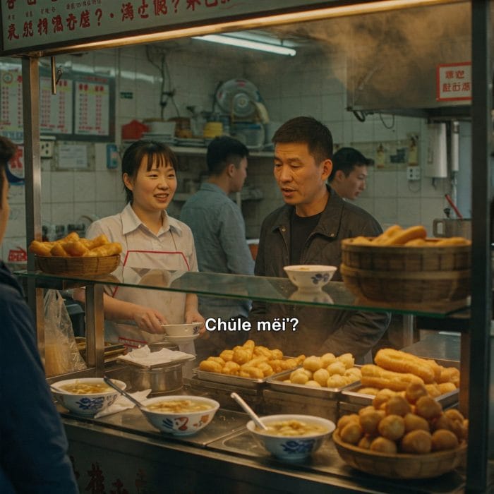 中国の朝食店で店主が客に「吃了吗？」と声をかけている